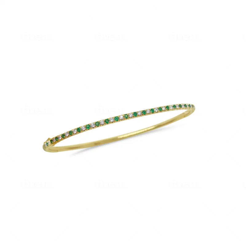 Yellow Gold Emerald Bangle- Diameter 2.5 inches sold by Meira T
