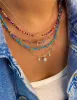 Turquoise Bead and Gold Plated Ball Drop Necklace. sold by Meira T