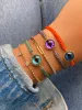 Brown Diamond and Blue Eye Orange Chord Bracelet sold by Meira T