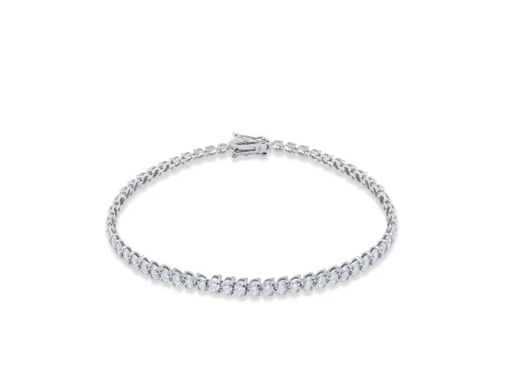 White Gold 3 Prong Tennis Bracelet sold by Meira T