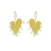 Yellow Gold Heart and Pearl Earrings sold by Meira T