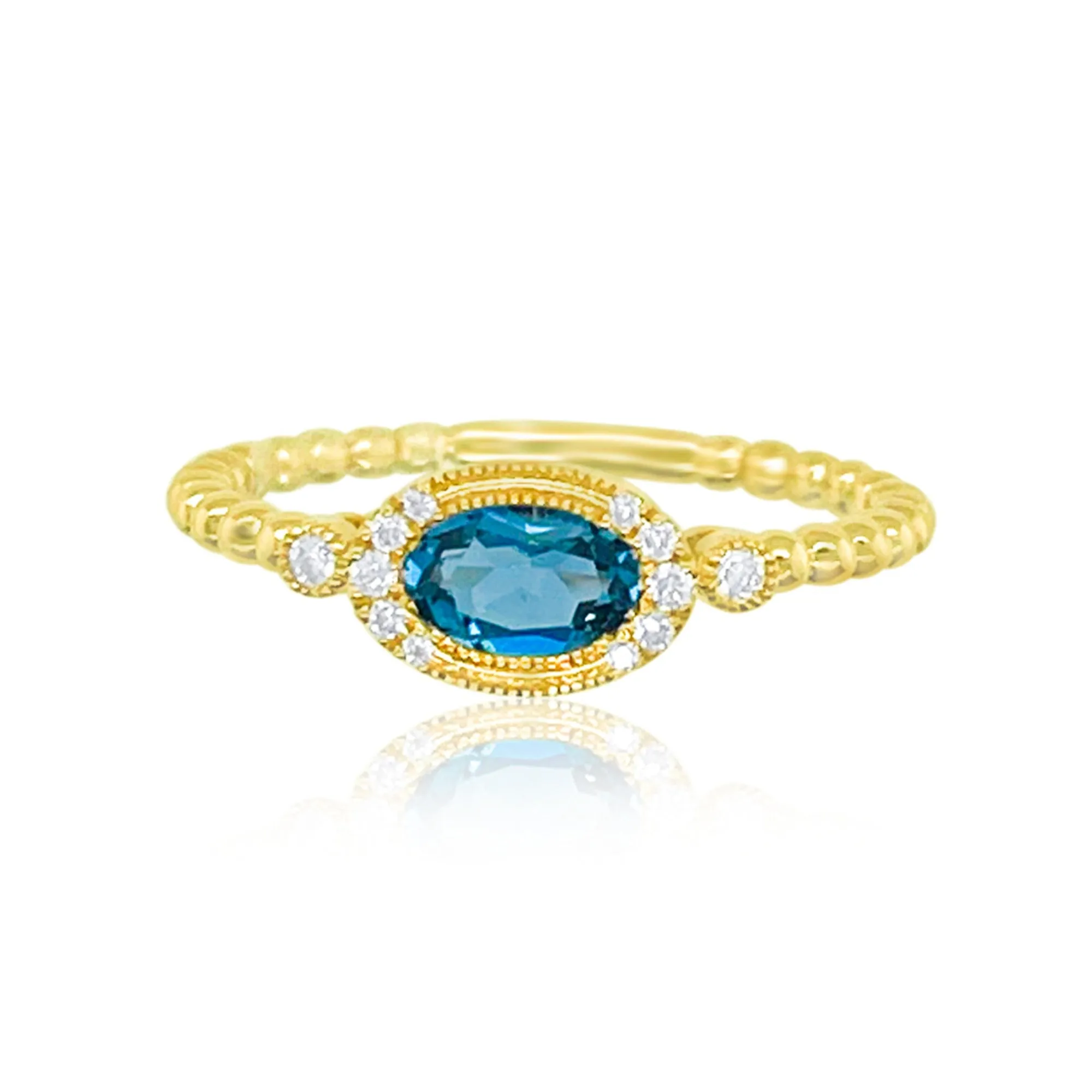 Yellow Gold Blue Topaz Diamond Ring sold by Meira T