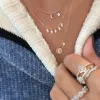 Rose Gold Mini Moon and Star Necklace sold by Meira T