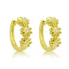 Yellow Gold Flower and Diamond Huggies sold by Meira T