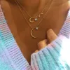 Crescent Moon and Star Necklace sold by Meira T