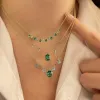 White Gold Emerald and Diamond Necklace sold by Meira T