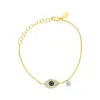 Yellow Gold Diamond Evil Eye and Charm Bracelet sold by Meira T