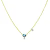 Dainty Blue Topaz and Bezel Necklace sold by Meira T