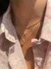 Dainty Yellow Gold Diamond Necklace sold by Meira T