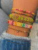 Dainty Rainbow and Gold Microbead Bracelet sold by Meira T