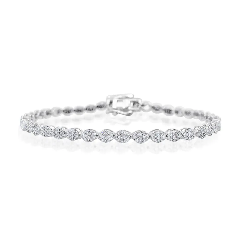 White Gold 3 Carat Tennis Bracelet Oval Shaped Pave Diamond Links sold by Meira T