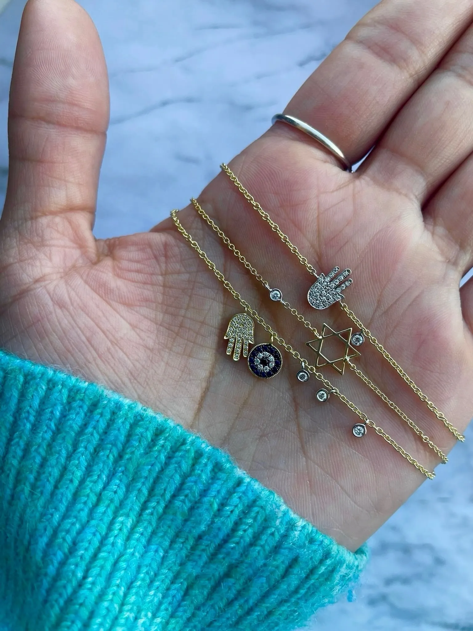 Diamond Hamsa and Bezel Bracelet sold by Meira T