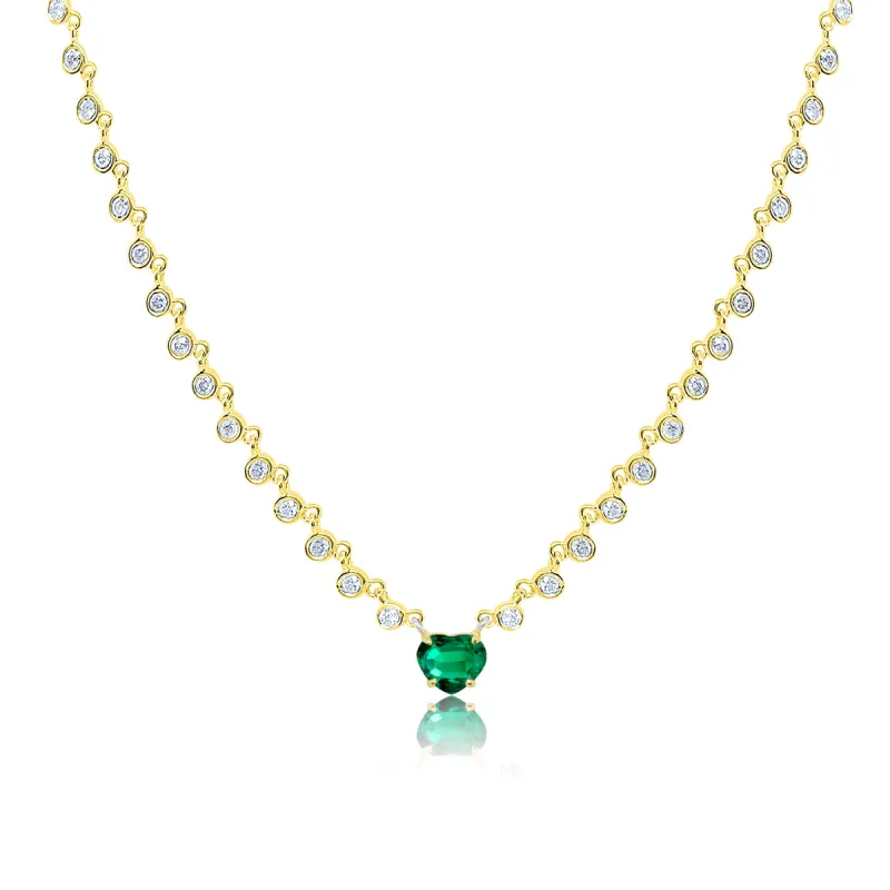 Yellow gold Emerald Heart and Diamond Necklace sold by Meira T