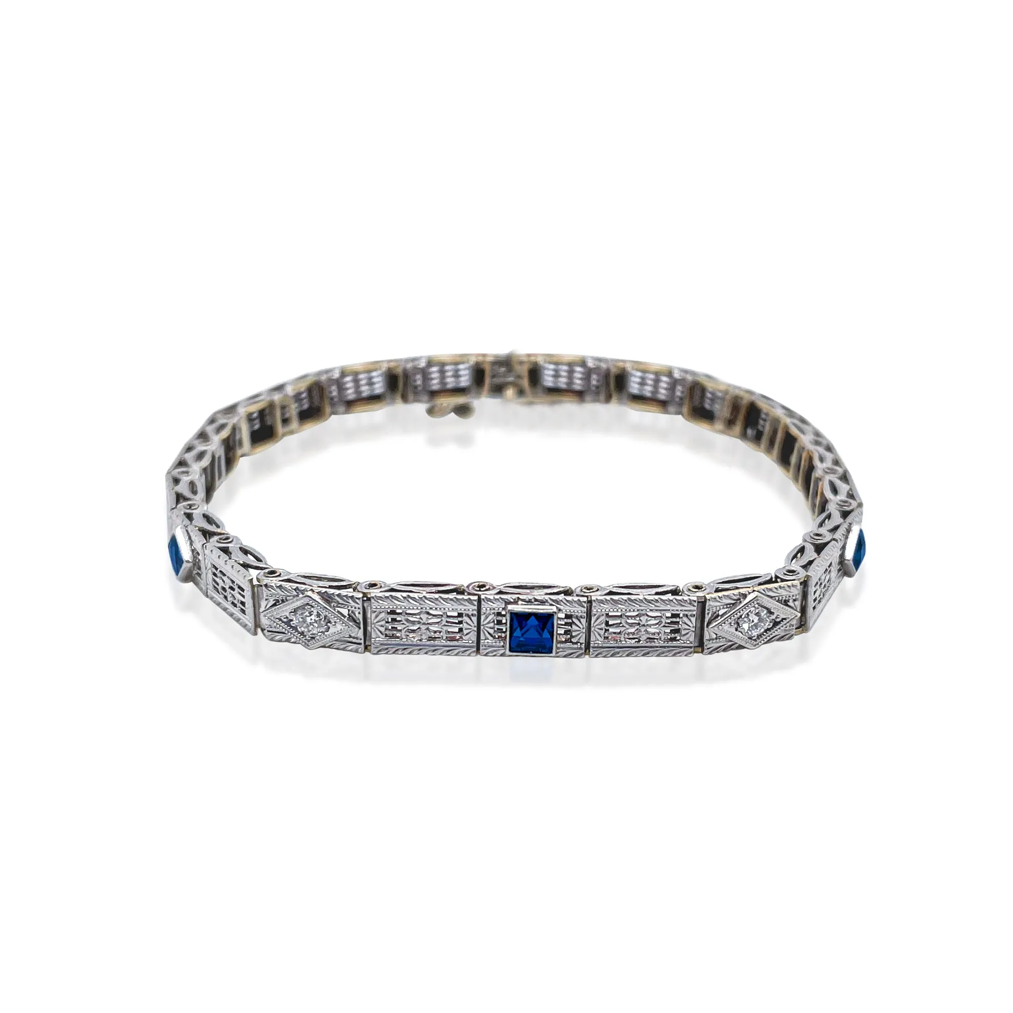 14k Gold Sapphire and Diamond intricate bracelet sold by Meira T