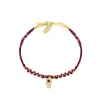 Red String 14 Kt Yellow Gold Diamond Hamsa Bracelet Diamonds and Garnet sold by Meira T