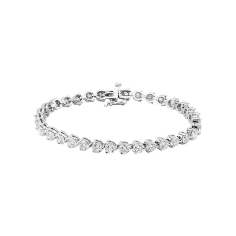 7 carat White Gold Three Prong Lab Grown Diamond Tennis Bracelet sold by Meira T