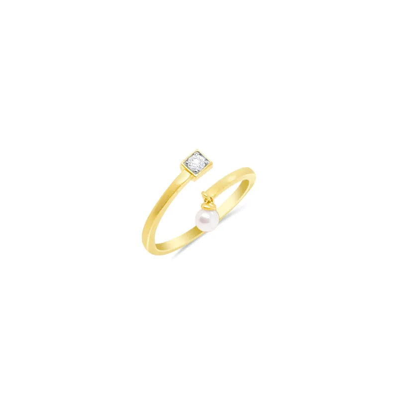 Diamond and Pearl Twist Ring sold by Meira T