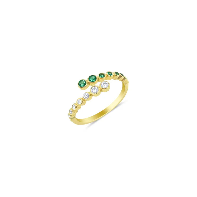 Emerald and Diamond Twist Ring sold by Meira T