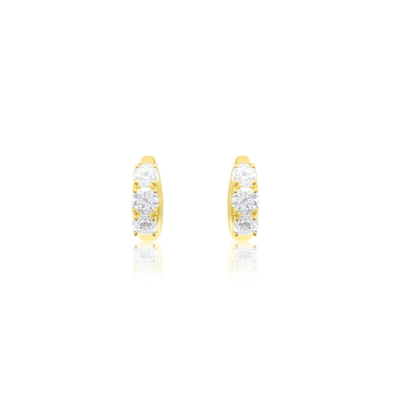 Yellow Gold and Diamond Huggies sold by Meira T