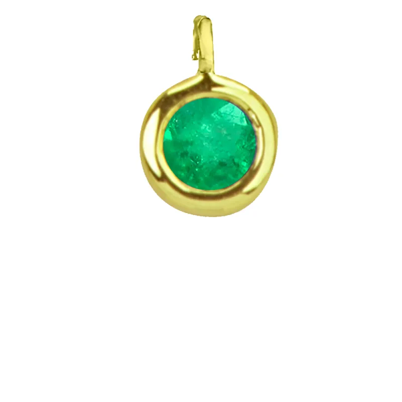 Yellow Gold Emerald Bezel sold by Meira T