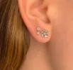 14 Kt White Gold Flower Stud with Dangling Bezel Diamond .10 Cts sold by Meira T