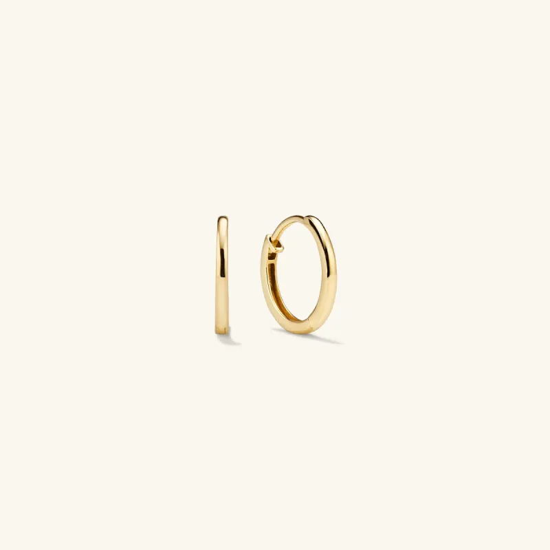14k Yellow and White Gold Easy Huggie Hoop Earrings - Jewelry | Mejuri sold by Mejuri