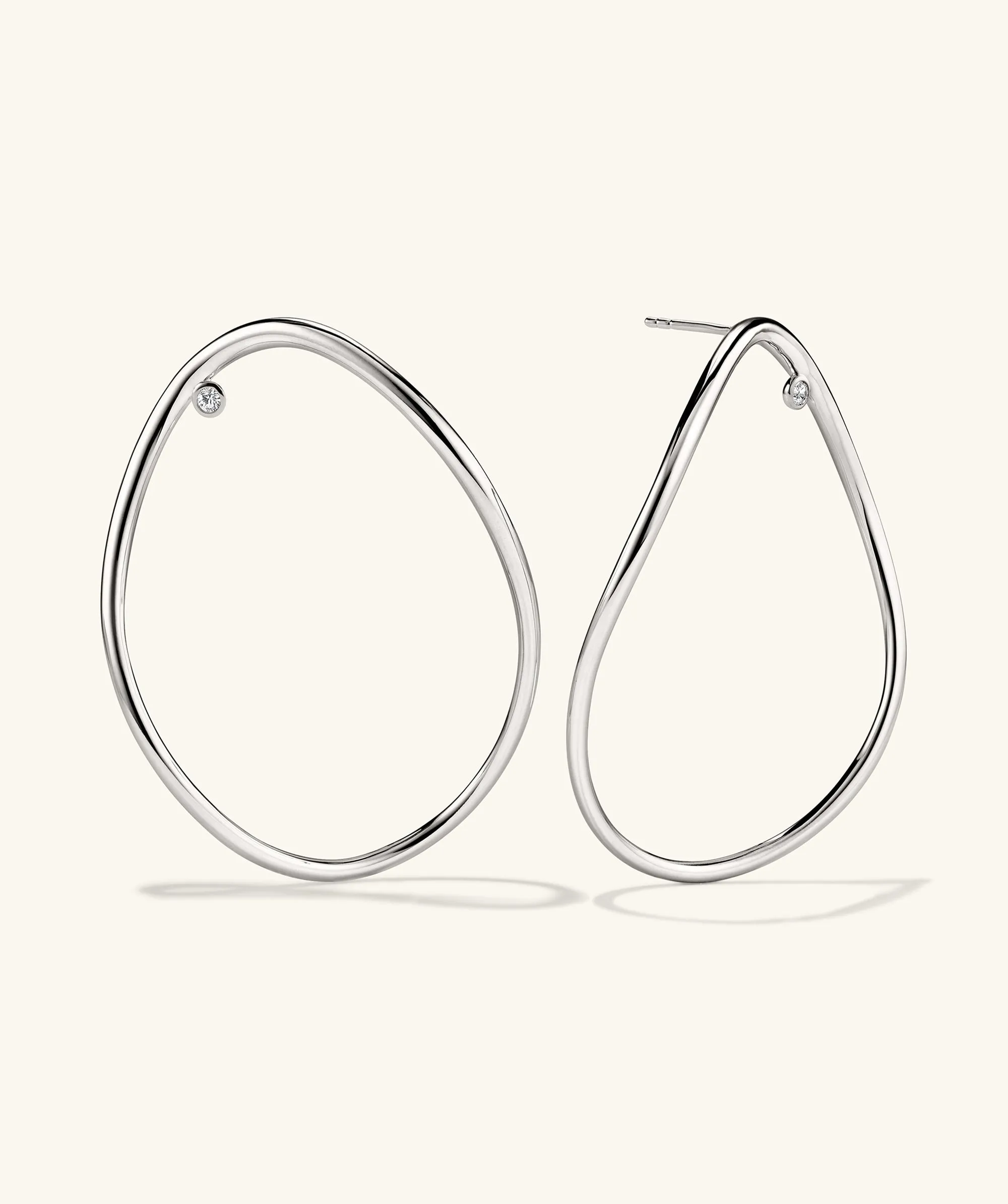 Sterling Silver Figure Oversized Hoop Earrings with White Sapphires - Jewelry | Mejuri sold by Mejuri
