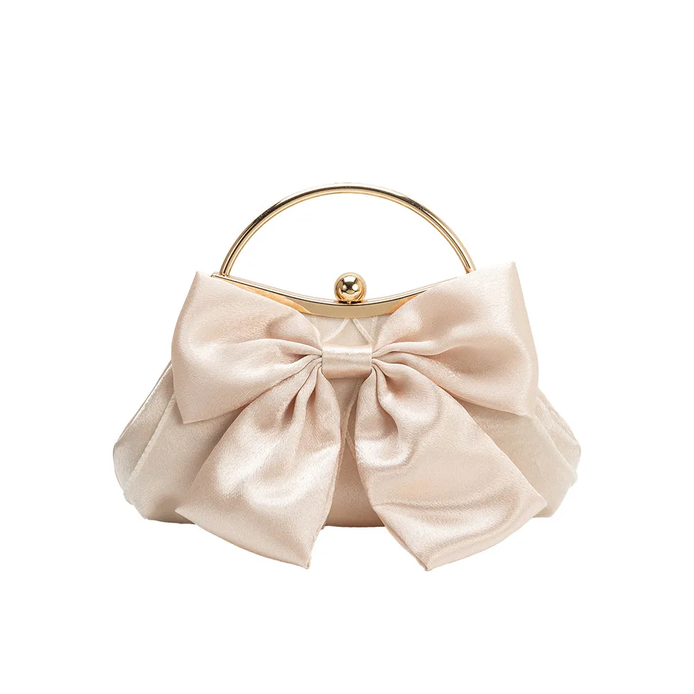 Grace Champagne Bow Top Handle Bag sold by Melie Bianco