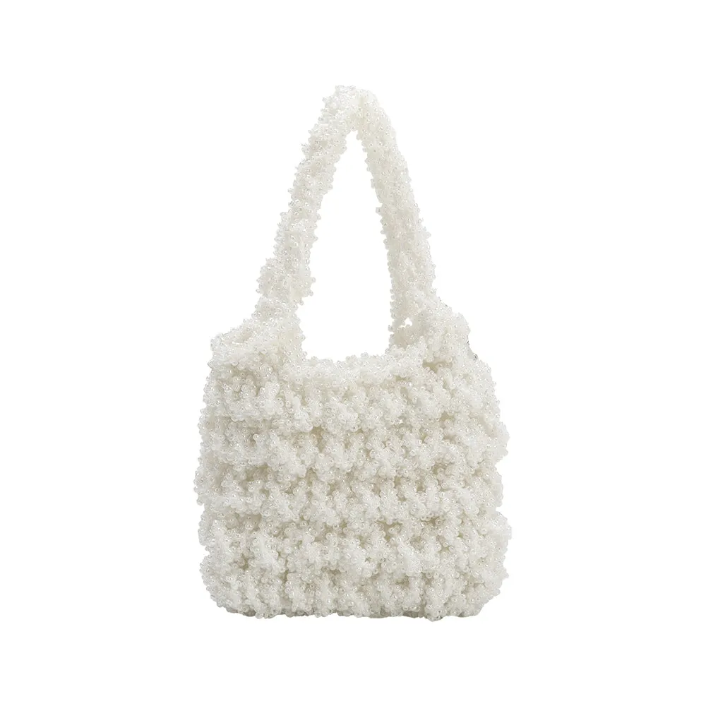 Norma Ivory Mini Beaded Crossbody Bag sold by Melie Bianco