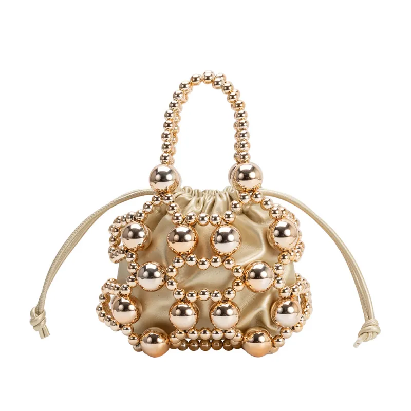 Bobby Gold Beaded Top Handle Bag sold by Melie Bianco