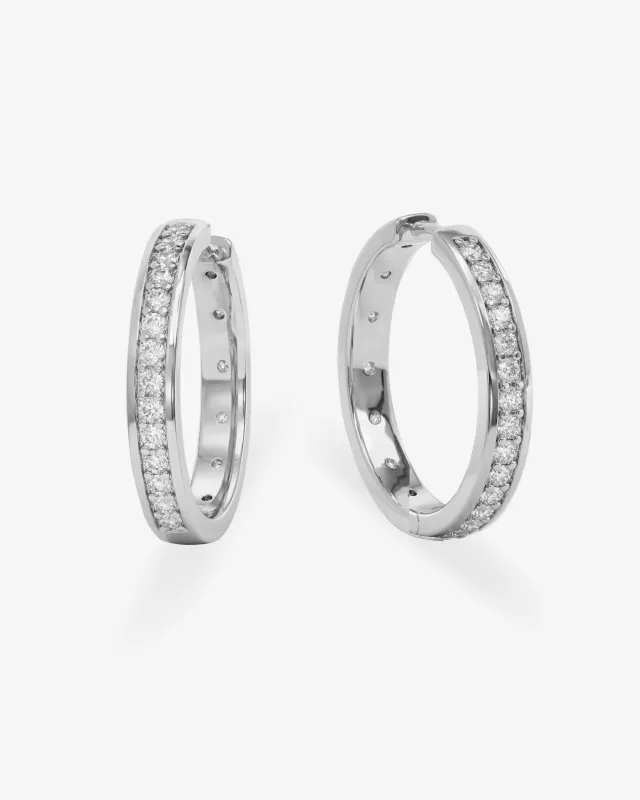Ashley Infinity Reversible Hoops 1" - Silver|White Diamondettes sold by Melinda Maria