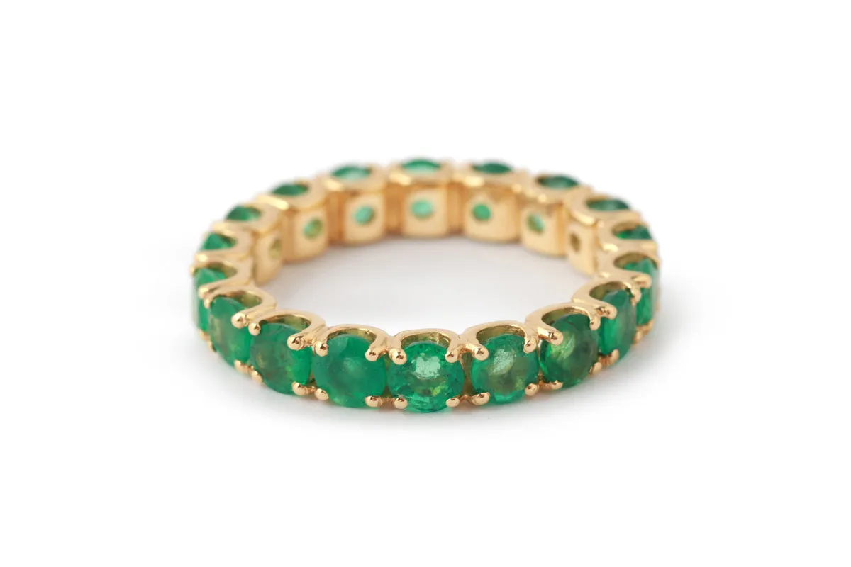 Round Emerald Eternity Band sold by Melissa Joy Manning