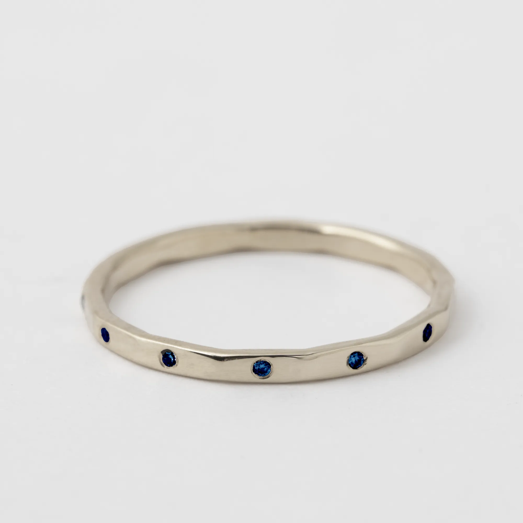 12 Blue Sapphire Band - 18 Karat White Gold sold by Melissa Joy Manning