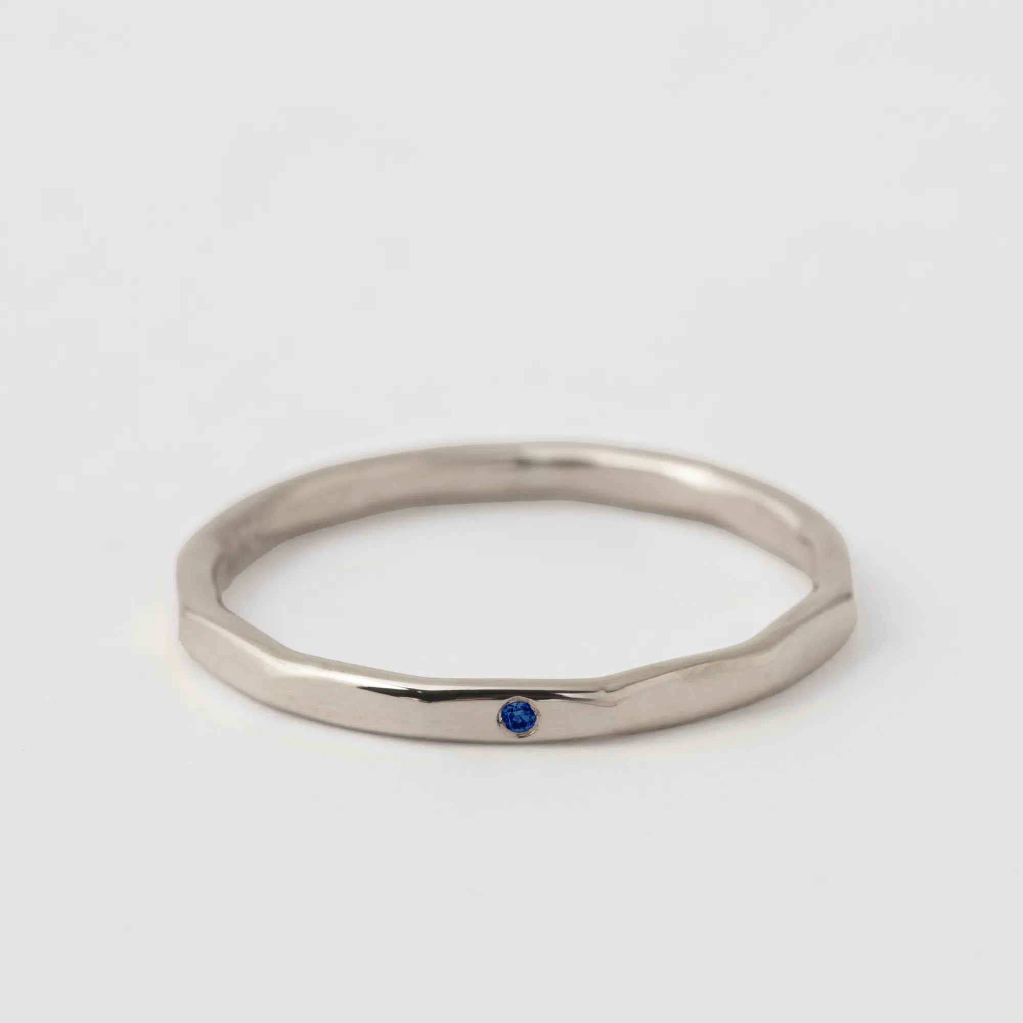 Single Flush Set Blue Sapphire Band - 18k White Gold sold by Melissa Joy Manning