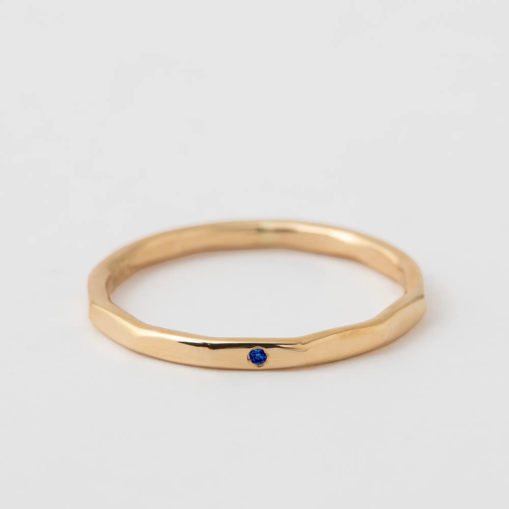 Single Flush Set Blue Sapphire Band - 14k Yellow Gold sold by Melissa Joy Manning