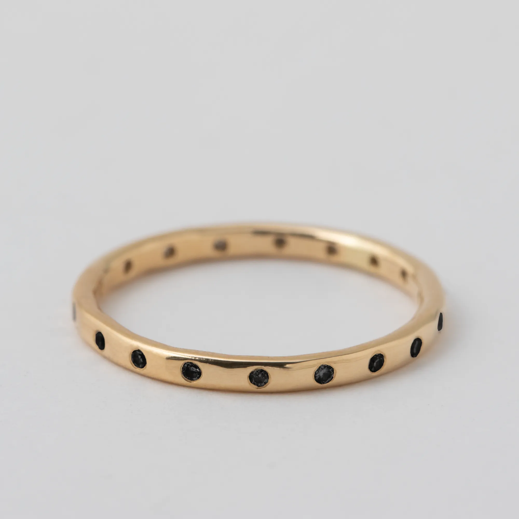 Flush Set 18 Black Diamond Band - 14k Yellow Gold sold by Melissa Joy Manning