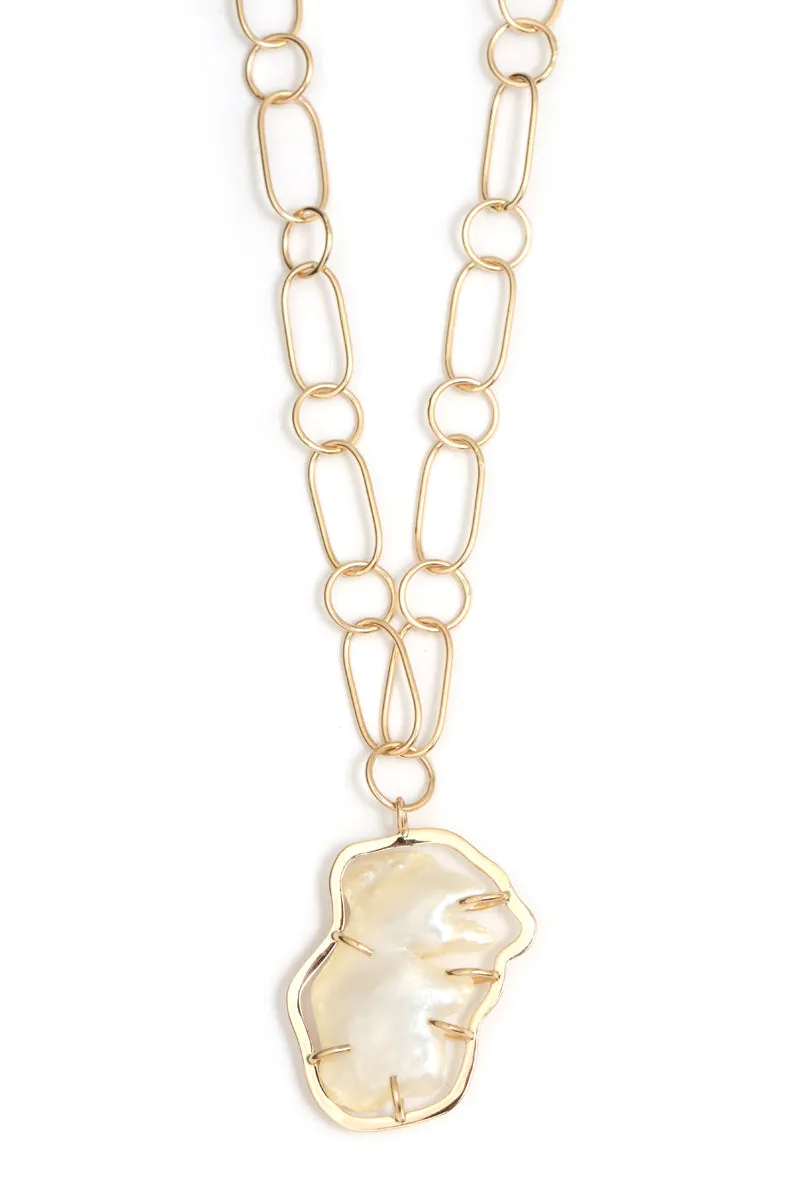 American natural pearl prong halo necklace sold by Melissa Joy Manning