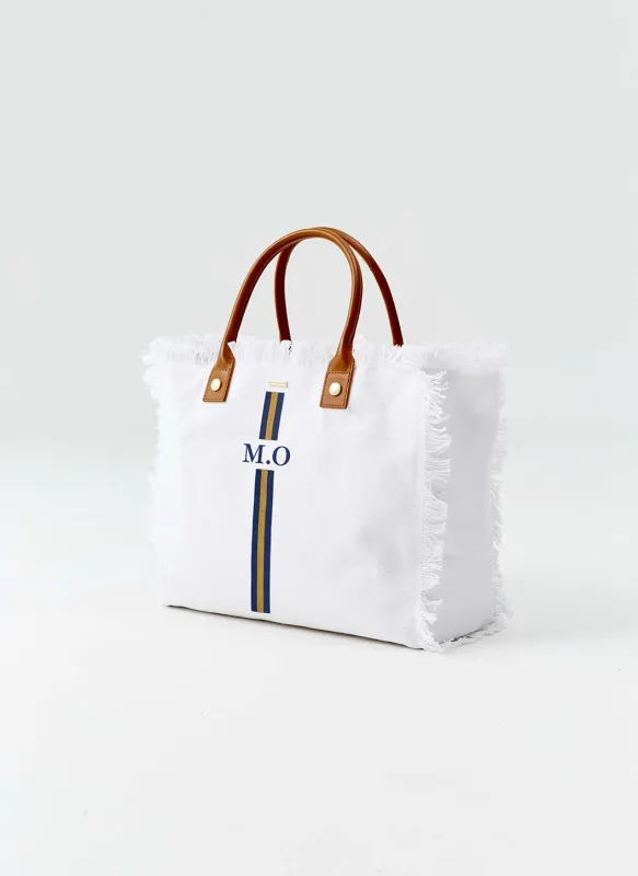 Cap Ferrat White Navy/Gold sold by Melissa Odabash