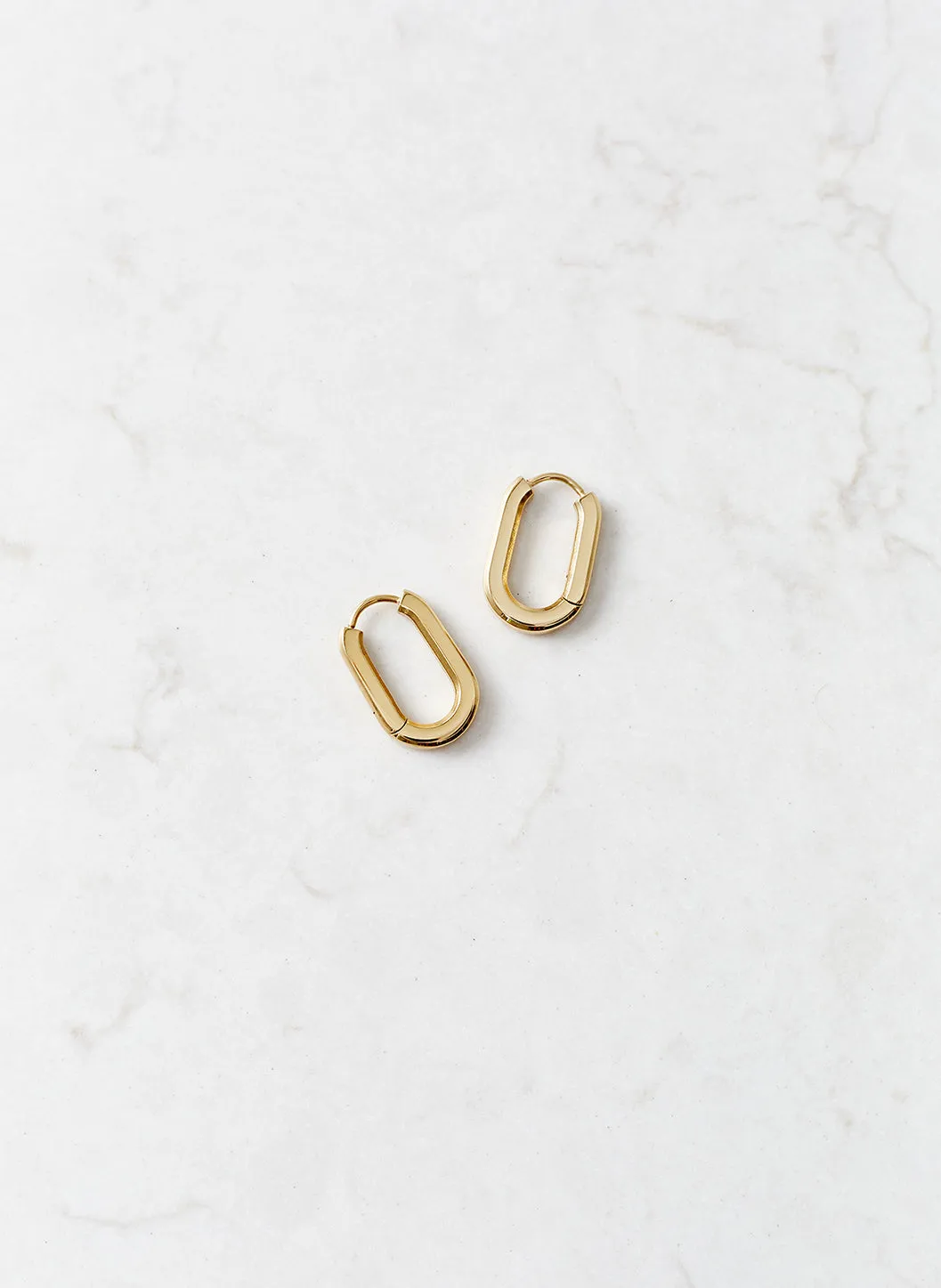 Gold Oval Hoop Huggy Earrings sold by Melissa Odabash product image thumbnail 2