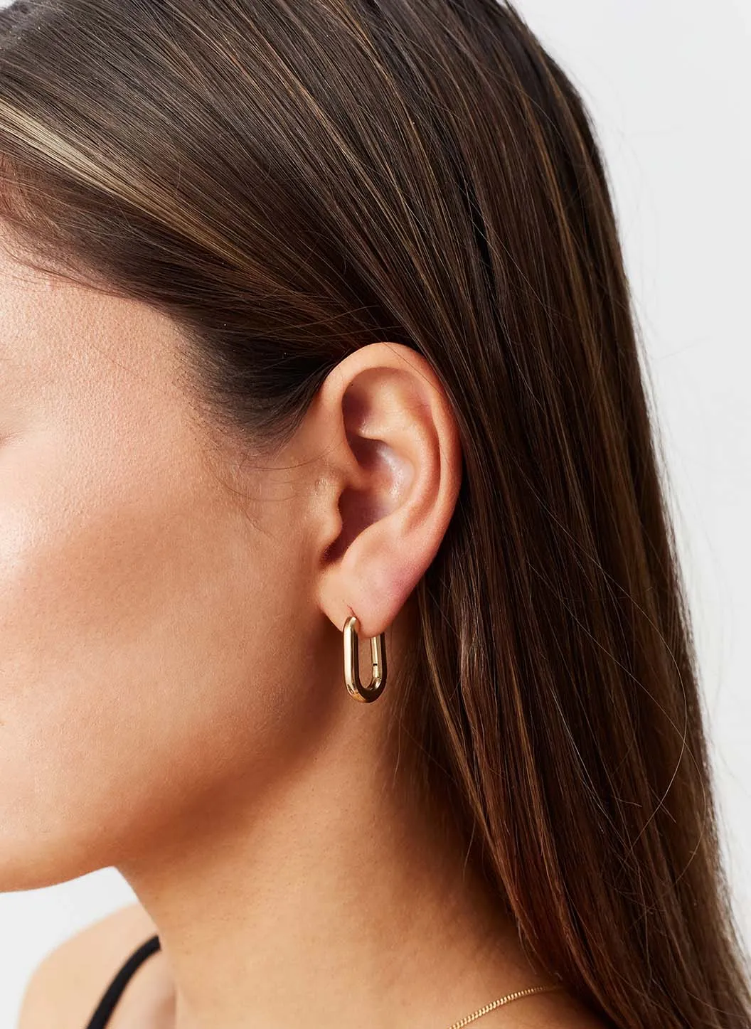 Gold Oval Hoop Huggy Earrings sold by Melissa Odabash product image thumbnail 3