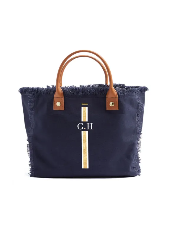 Porto Cervo Navy White/Gold sold by Melissa Odabash