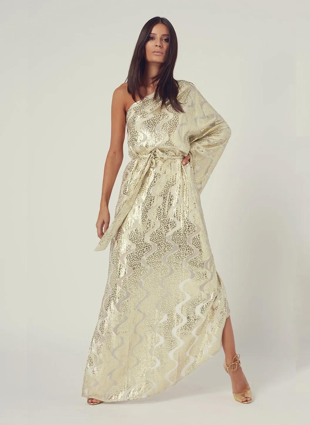 Look 6 One Sleeve Belted Maxi Dress Gold Shimmer sold by Melissa Odabash