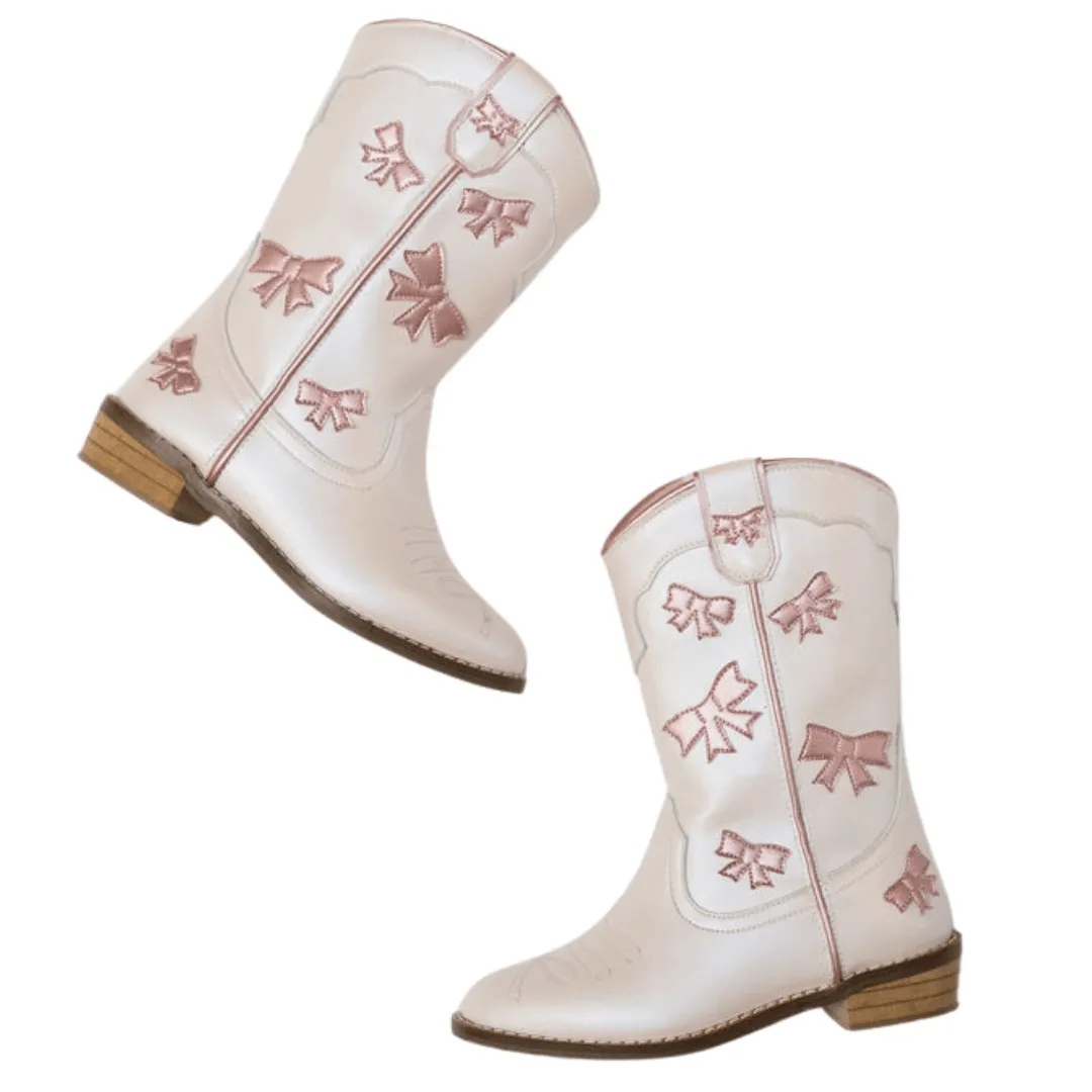 Cowgirl White + Pink Bow Boots sold by Meri Meri