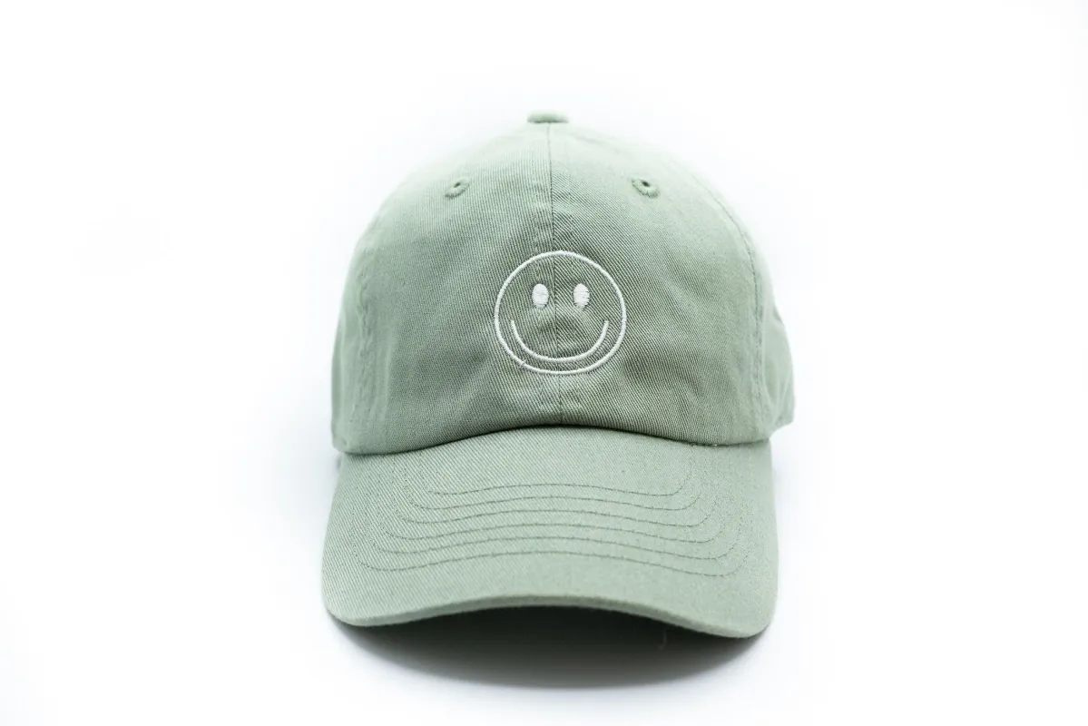 Dusty Sage Smiley Face Hat sold by Meri Meri