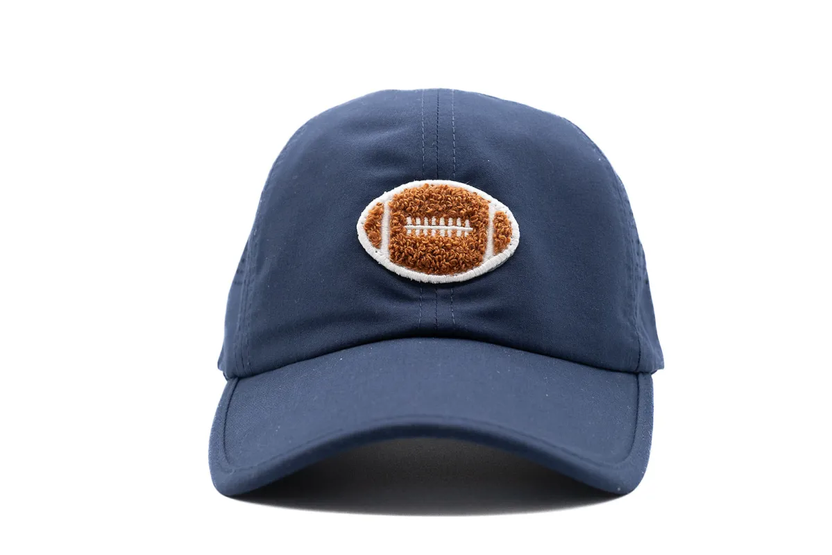 Navy Athletic Hat + Terry Football sold by Meri Meri