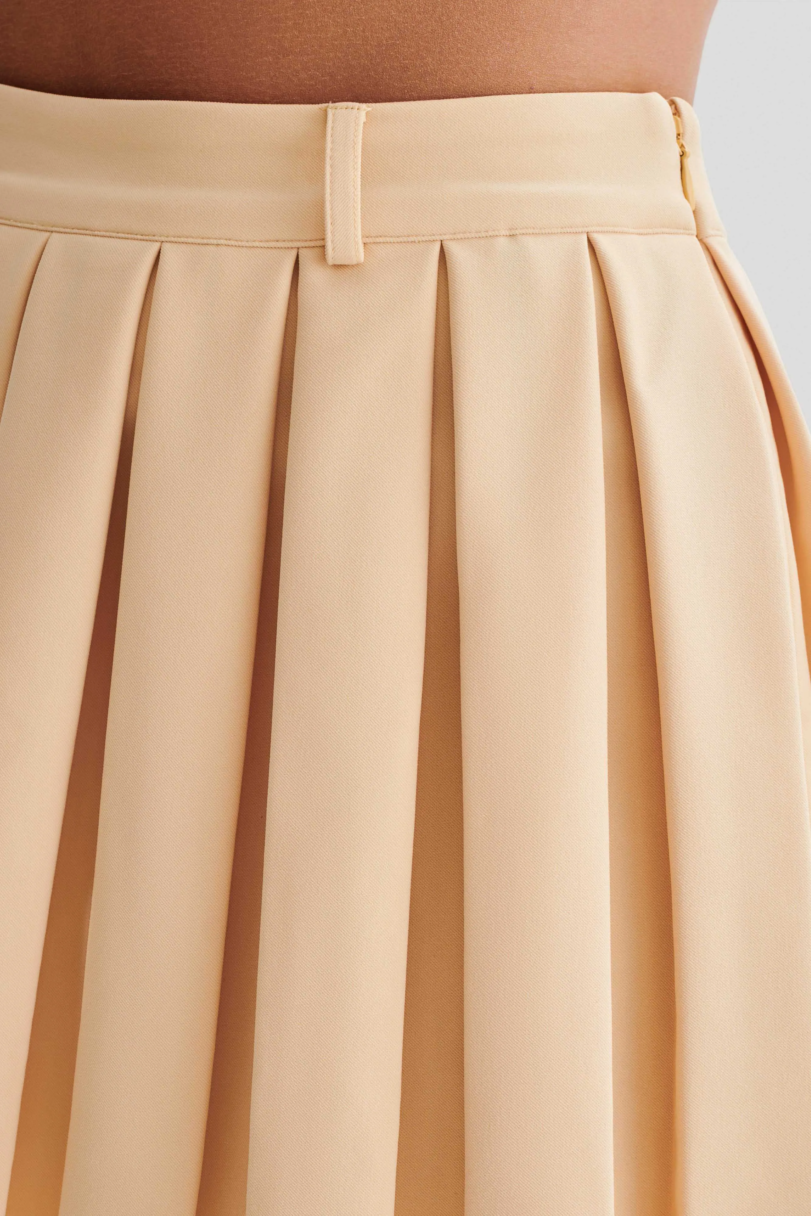 Mura Pleated Mini Skirt - Peach sold by Meshki product image thumbnail 3