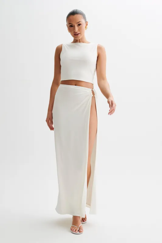 Suri Slinky Maxi Skirt With Gold Hardware - White sold by Meshki