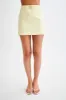 Letitia Suiting Mini Skirt With Buckle - Pastel Lemon sold by Meshki