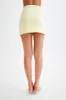 Letitia Suiting Mini Skirt With Buckle - Pastel Lemon sold by Meshki