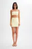 Letitia Suiting Mini Skirt With Buckle - Pastel Lemon sold by Meshki